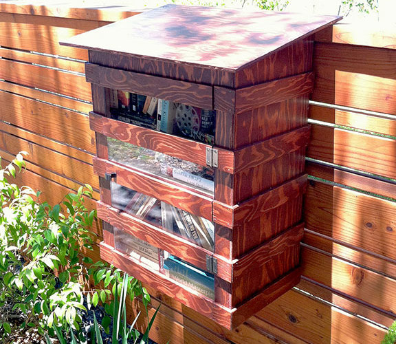Free library on fence
